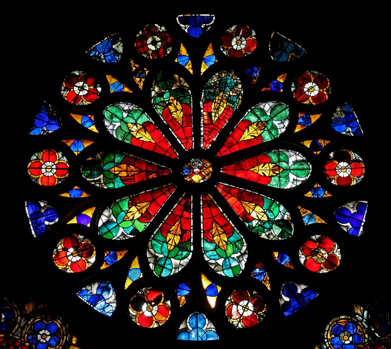 Window w17 depicting a rose with naturalistic design by French School