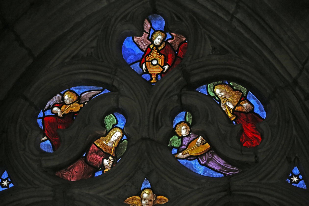 Window depicting angel musicians and the Host by French School