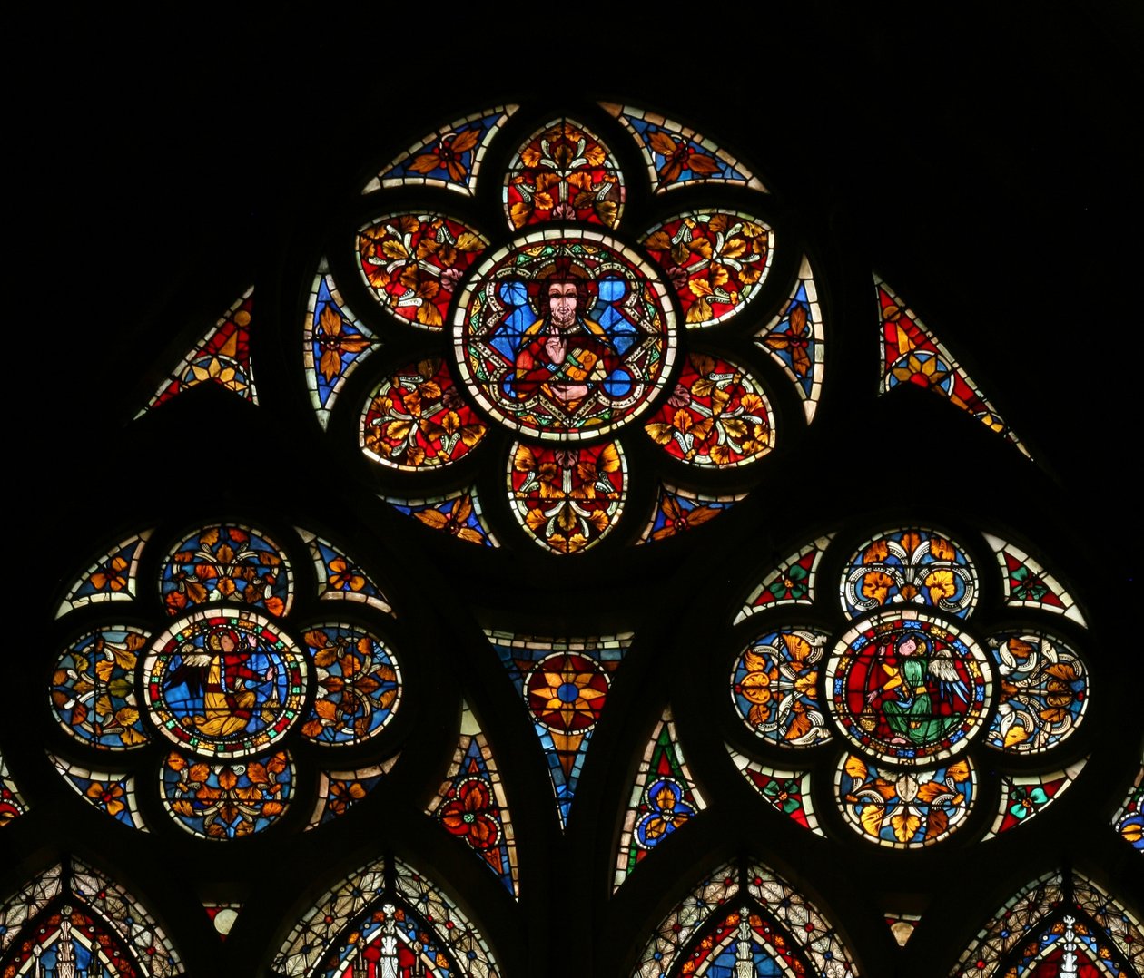 Window w203 depicting the tracery lights with three angels by French School