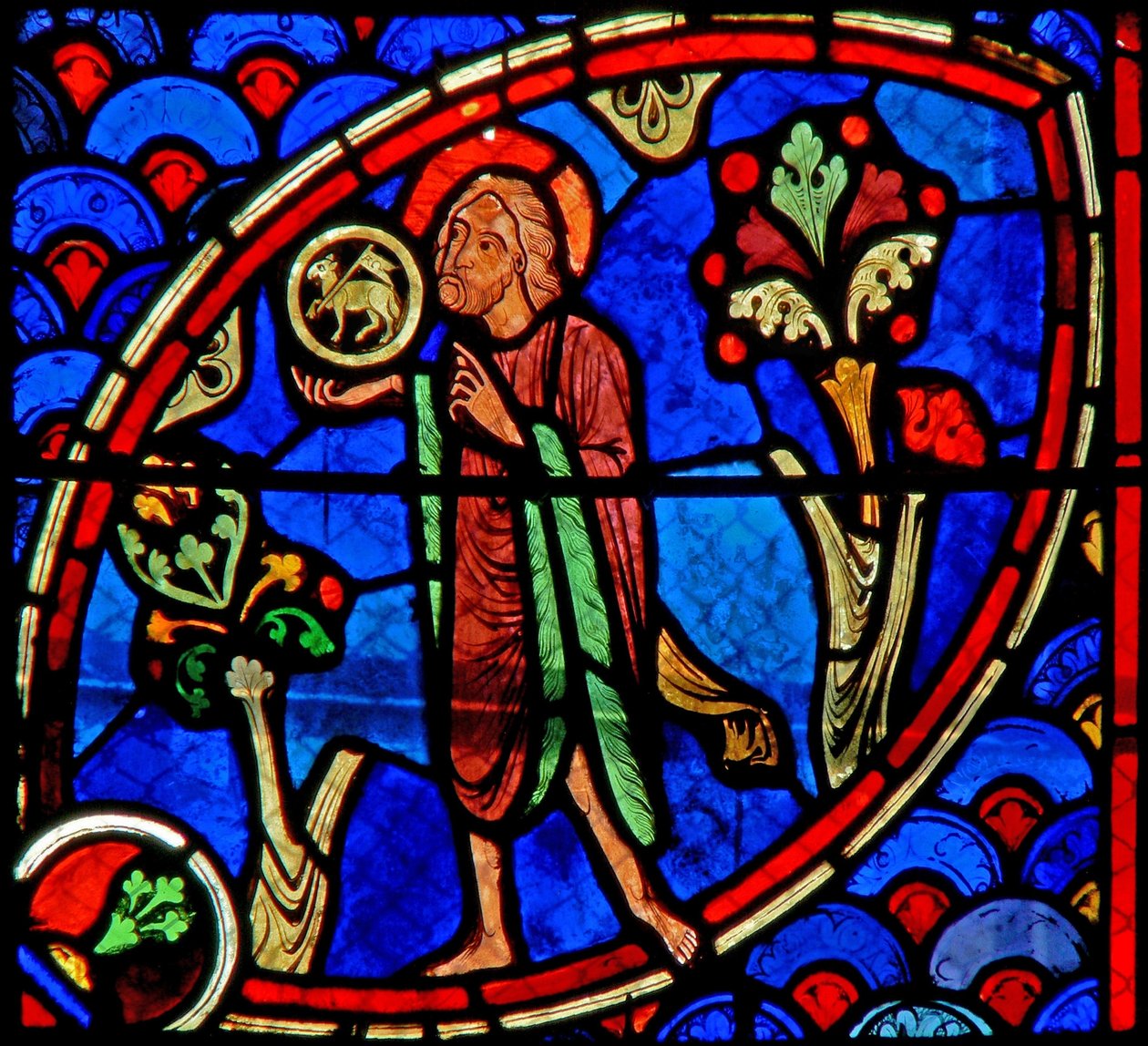 Window w20 depicting St John the Baptist: Ecce Agnus Dei by French School