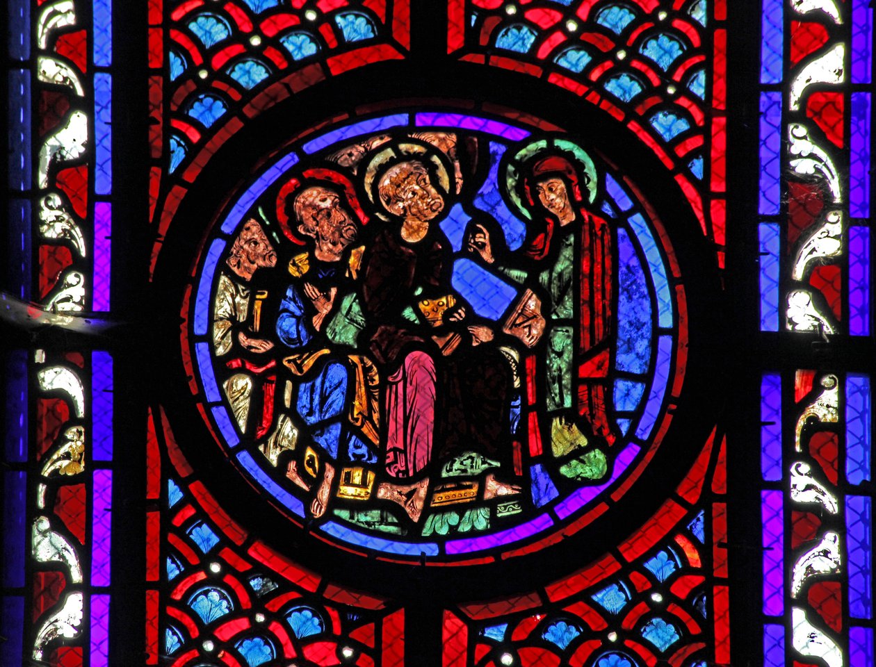 Window w2 depicting a scene from the life of St Mary Magdalene - the saint tells the disciples of the Resurrection by French School