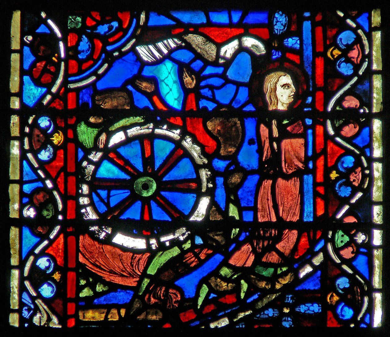 Window depicting a scene from the life of St Catherine: the torturers prepare the wheel for her ordeal by French School