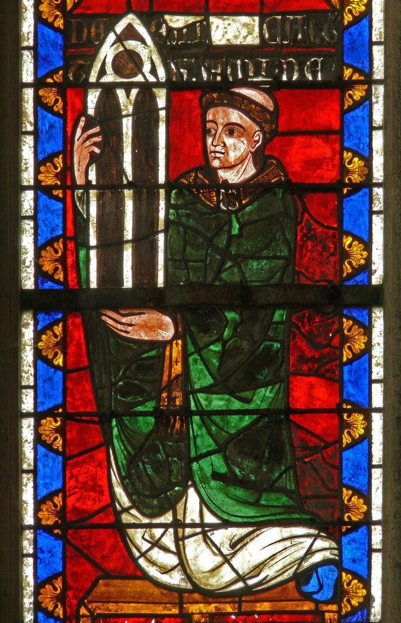 Window w7 depicting donors - the doyen of Argentan giving a window by French School