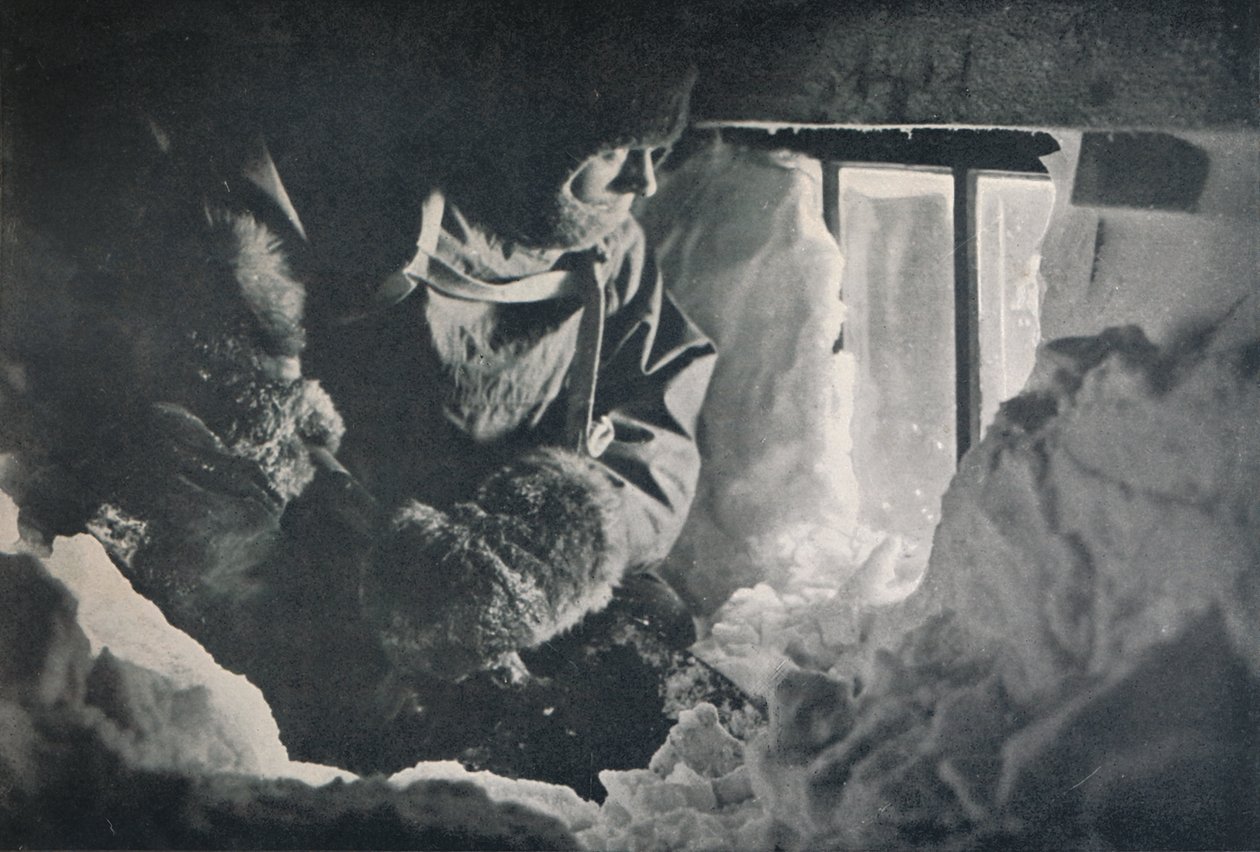 Clearing Drift from Window of Hut at Cape Adare by G. Murray Levick