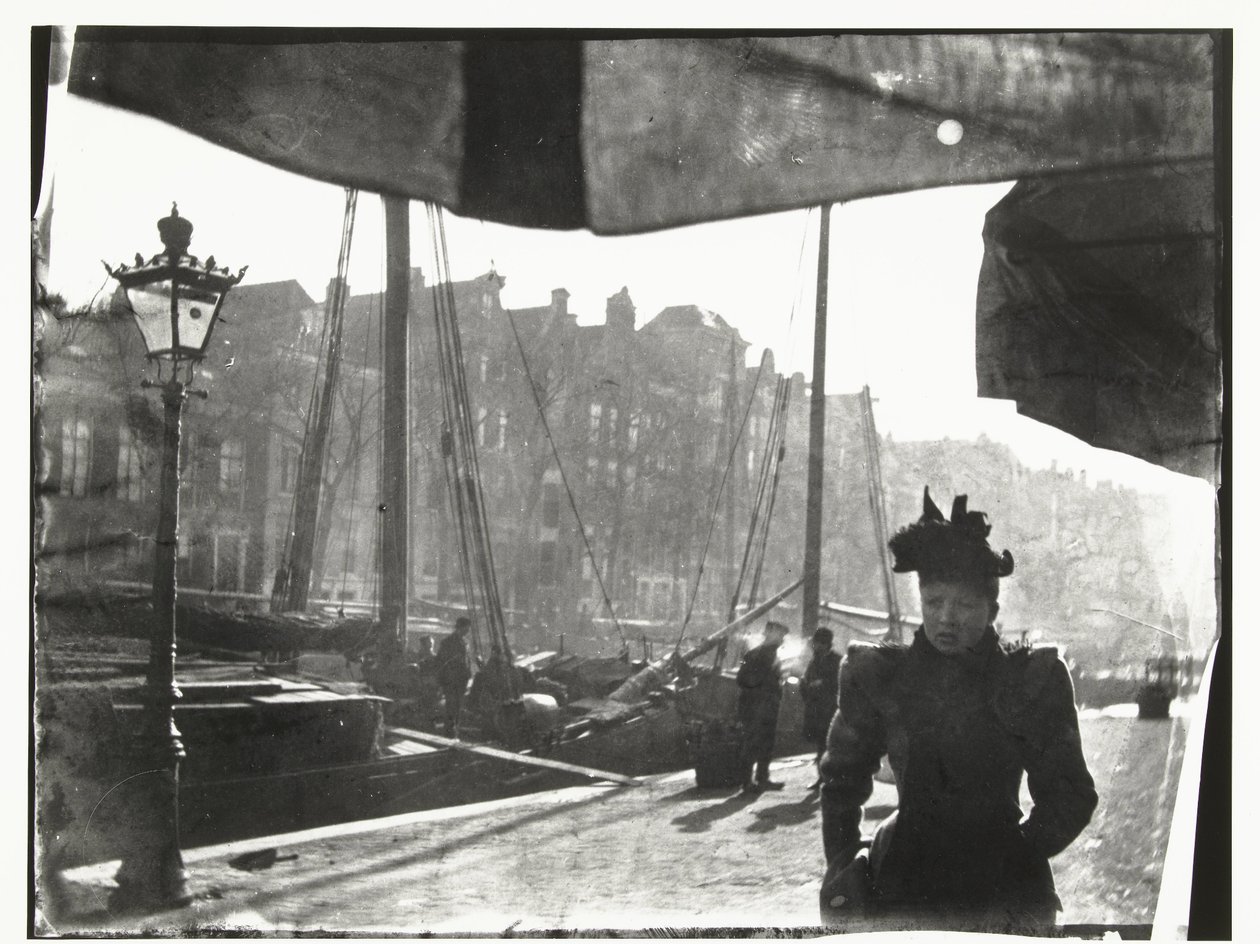 Portrait of a Woman Walking along the Prinsengracht in Amsterdam by George Hendrik Breitner