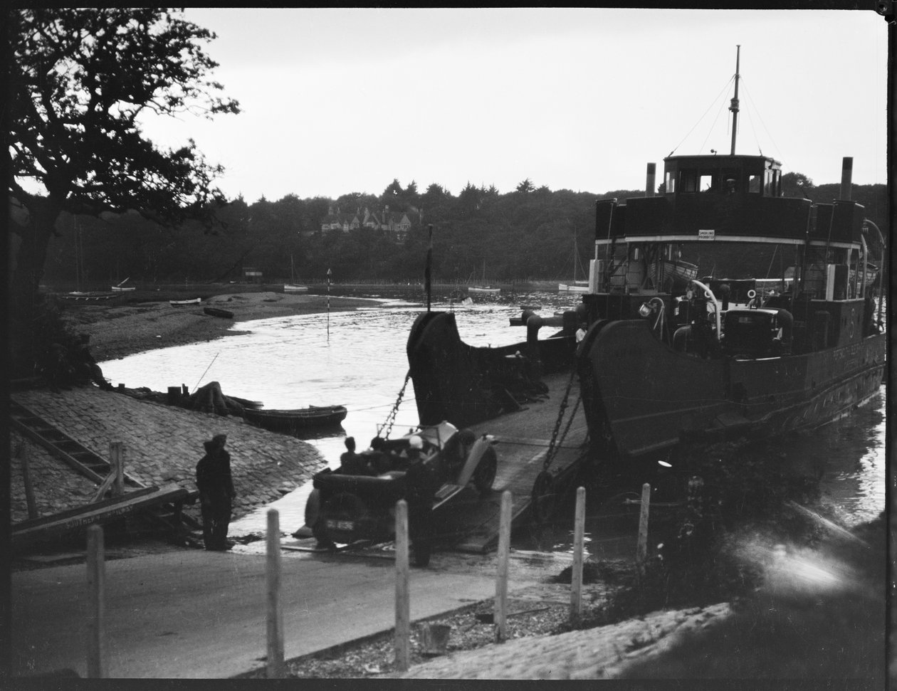 A car driving off the slipway onto the Isle of Wight Ferry by George R. Long