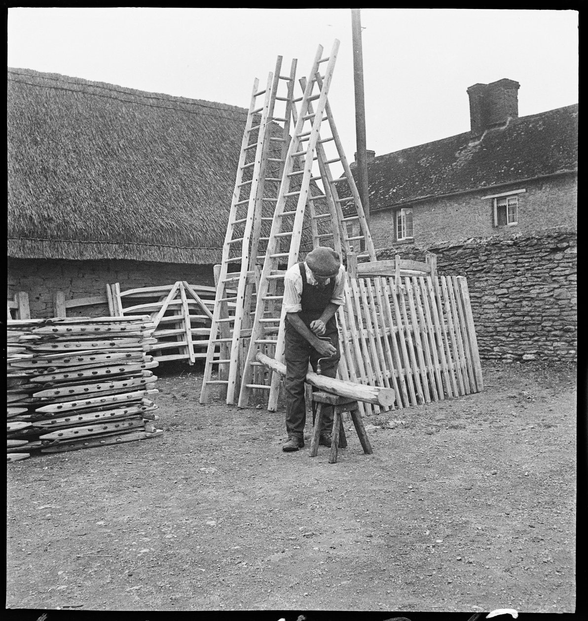 A man making a willow ladder in Aston by George R. Long