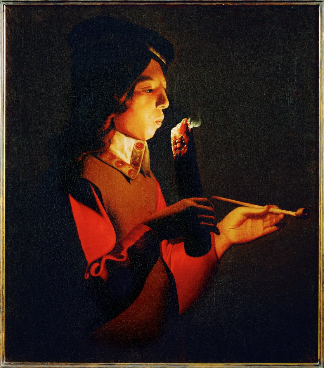 Boy Blowing on a Firebrand by Georges de la Tour