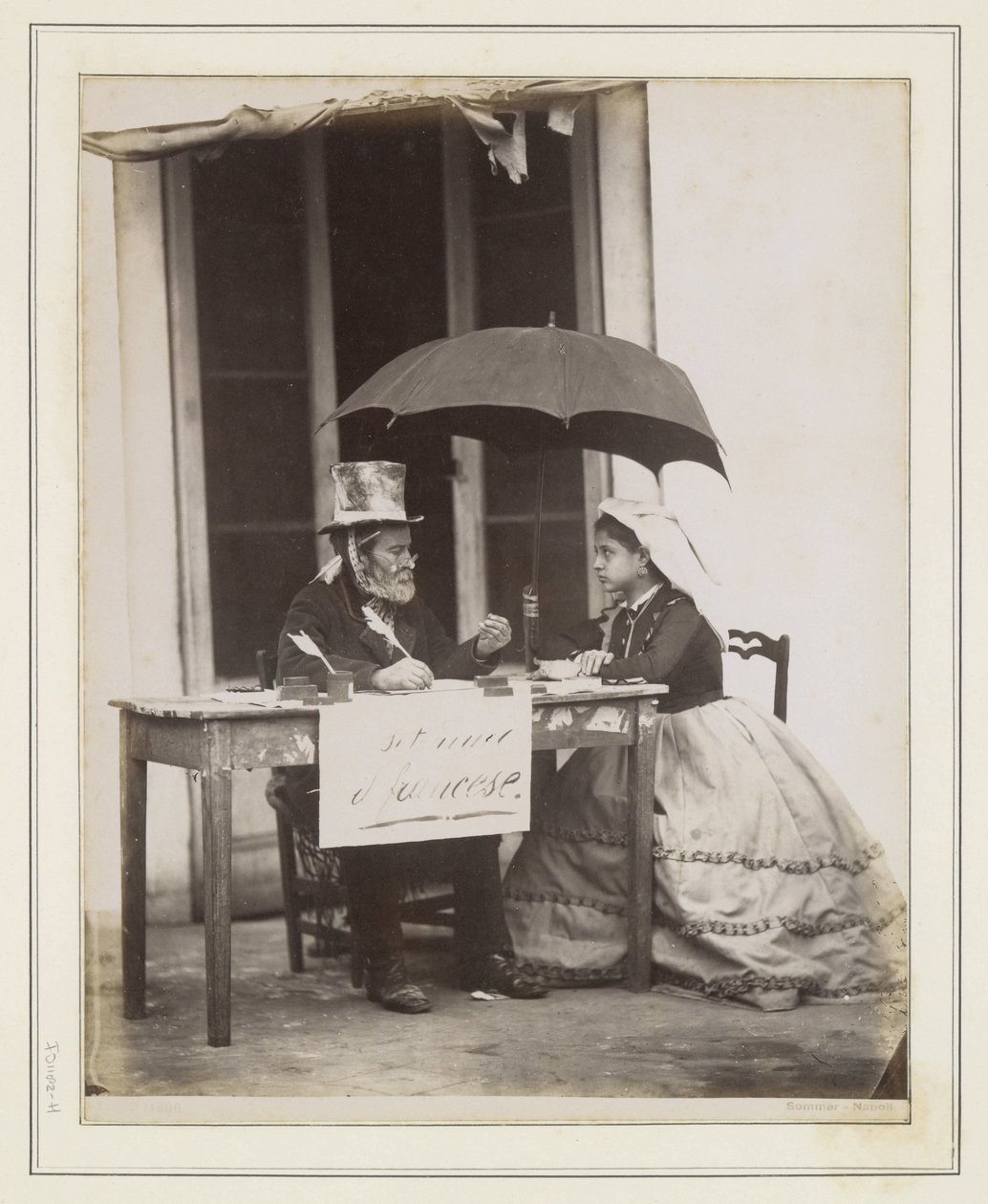 Writer with Young Woman at a Table on the Street in Italy by Giorgio Sommer