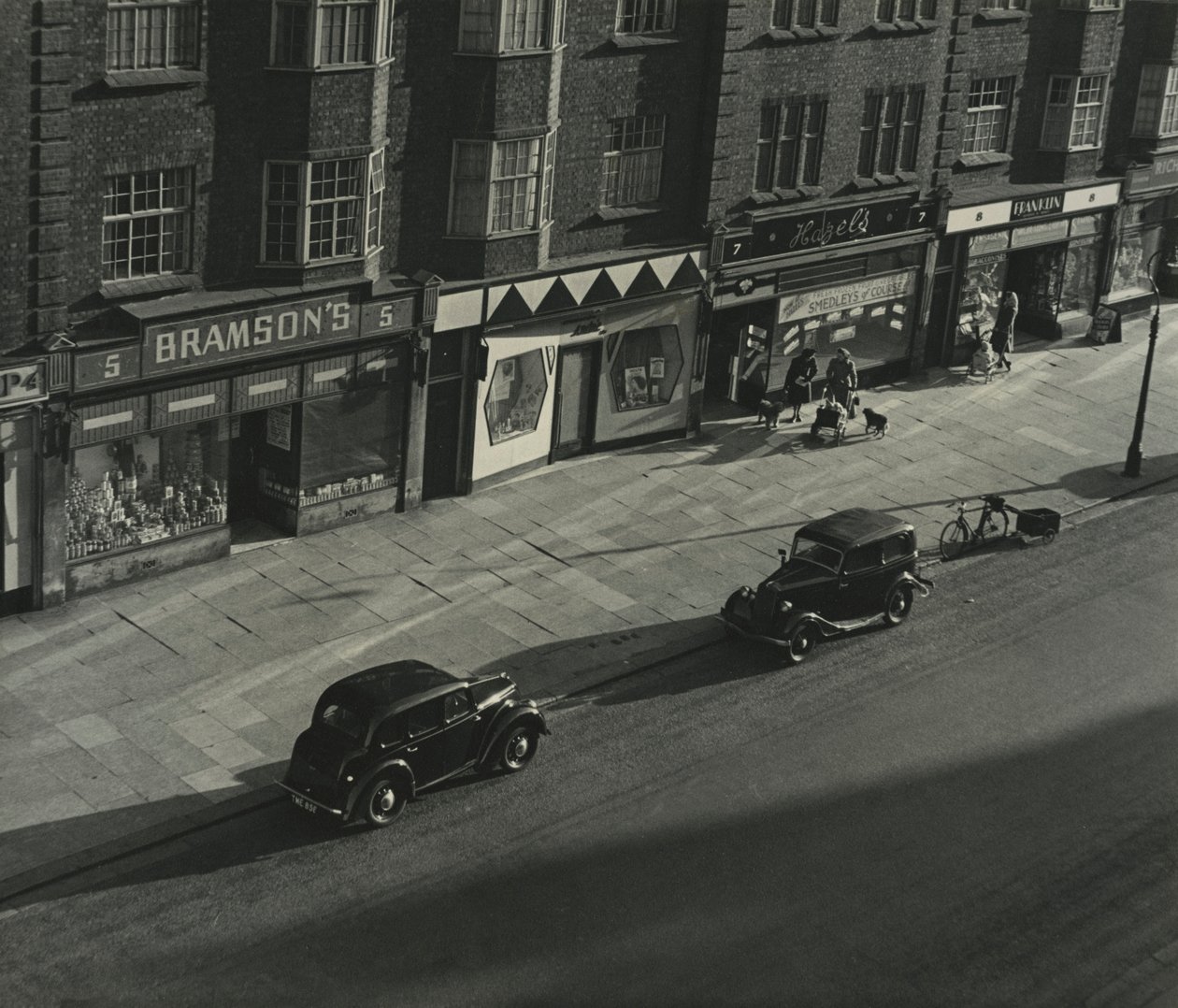 Street Scene in London by Godfrey Macdominic