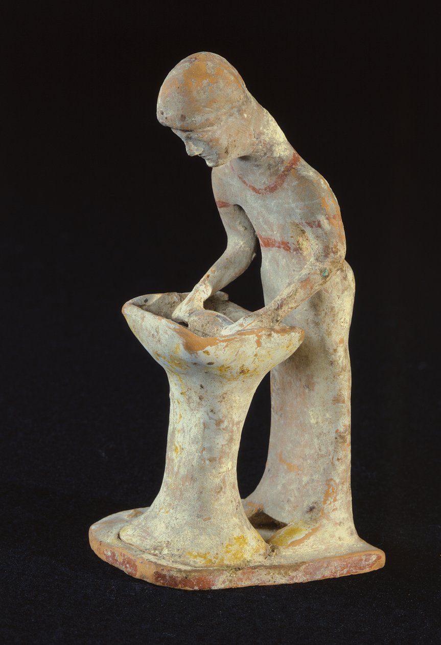 Statuette of a woman rolling pastry, from Tanagra, Boeotia by Greek