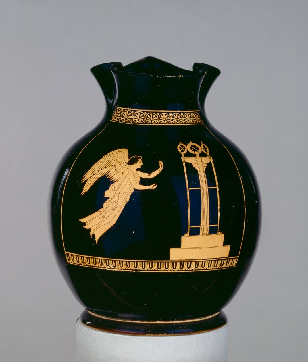 Attic Red-Figure Oinochoe Decorated with the Scene of a Winged Nike Flying with a Ribbon Towards a Tripod, Near the Calliope Painter, from Nola, c.430 BC by Greek