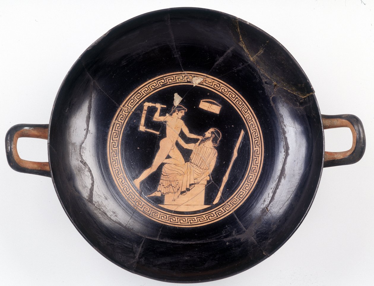 Painting on cup: Representation of Heracles waving a chair to knock out his music master, 470 BC. BNF, Medal Office by Greek