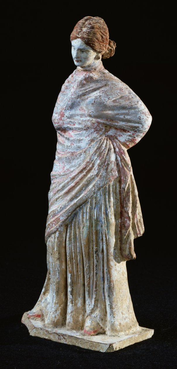 Statuette of a woman with draped clothing, from Tanagra, Boeotia by Greek