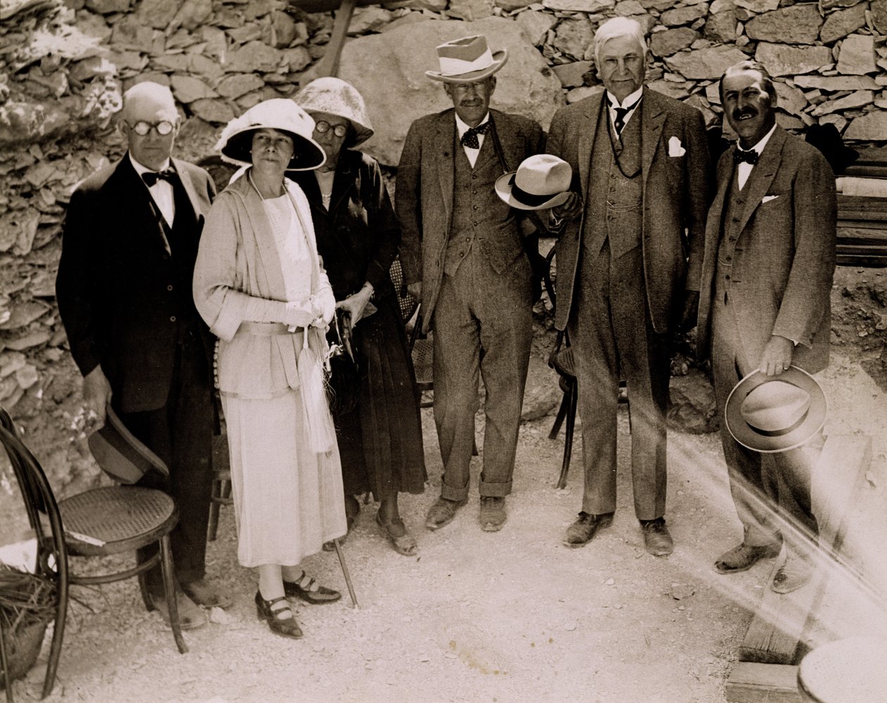 Howard Carter and a group of Europeans standing beside the excavations of the Tomb of Tutankhamun, Valley of the Kings by Harry Burton