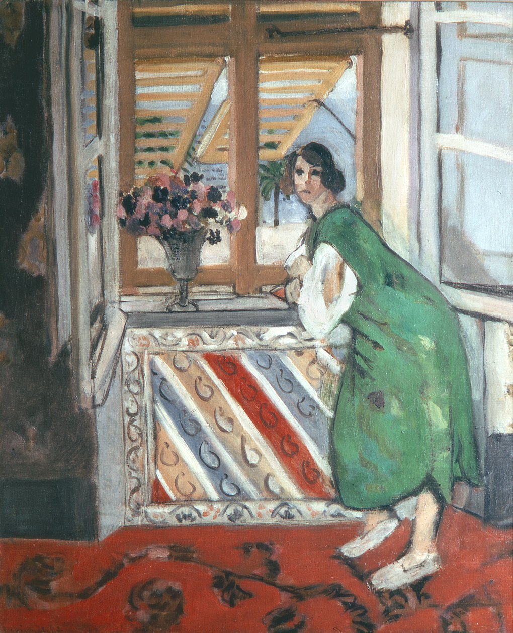 Interior at Nice: Young Woman in a Green Dress Leaning at the Window by Henri Matisse