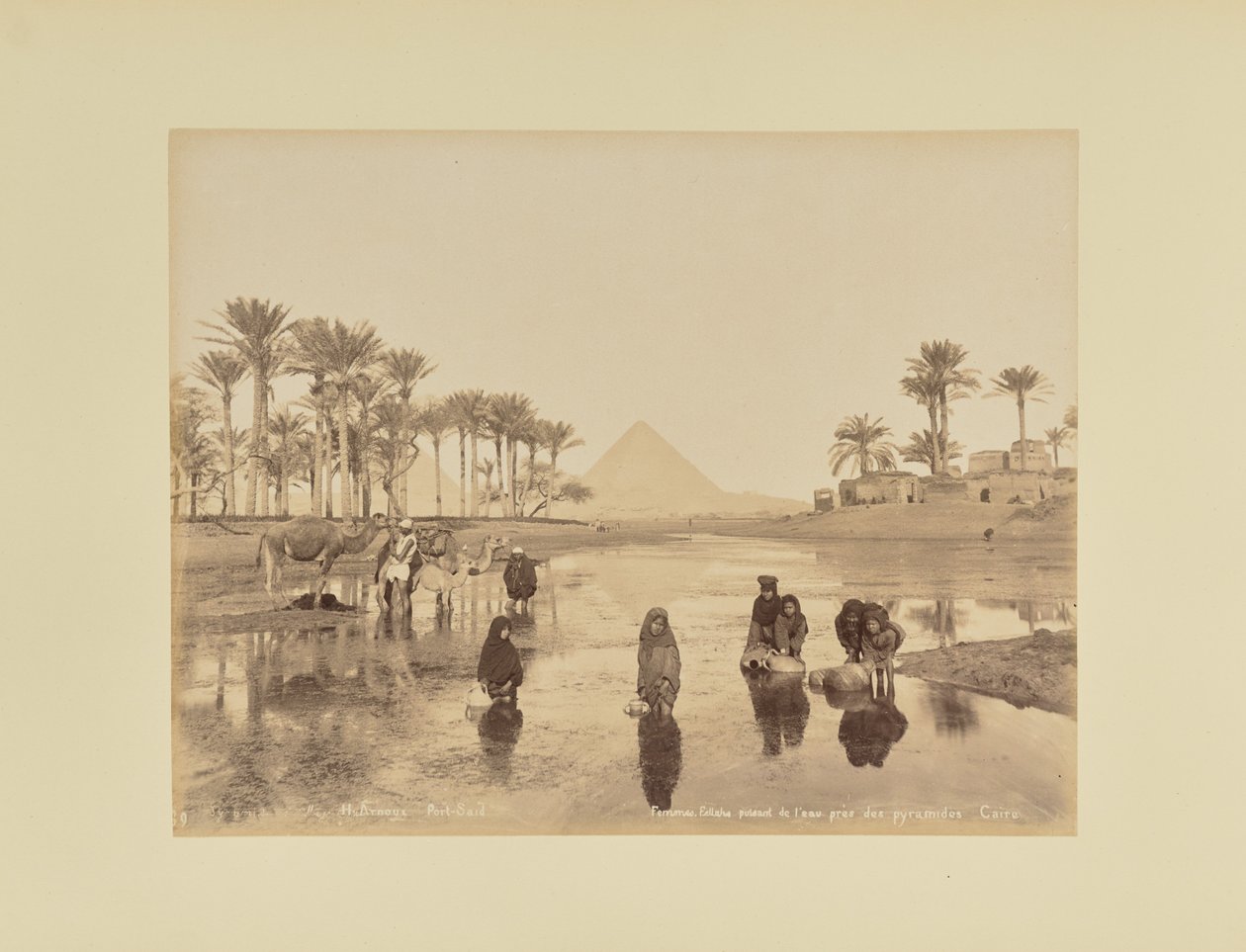 Women, Fellahs Drawing Water Near the Pyramids, Cairo by Hippolyte Arnoux