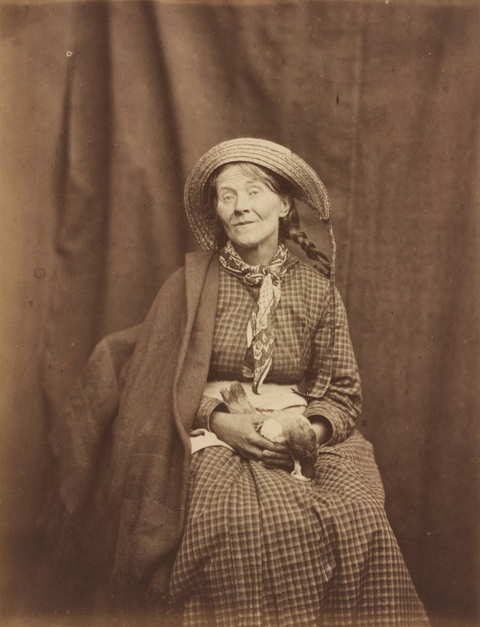 Woman Holding a Dead Bird, Surrey County Asylum, c. 1855 by Hugh Welch Diamond