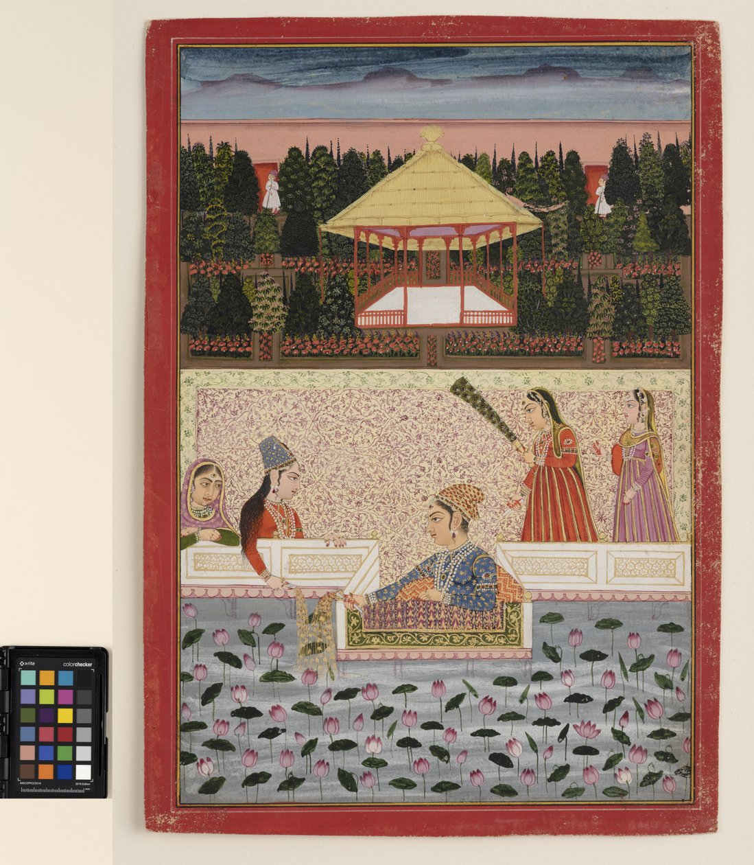 A prince and princess play with sparklers by a lotus pool, c.1760 by Indian School