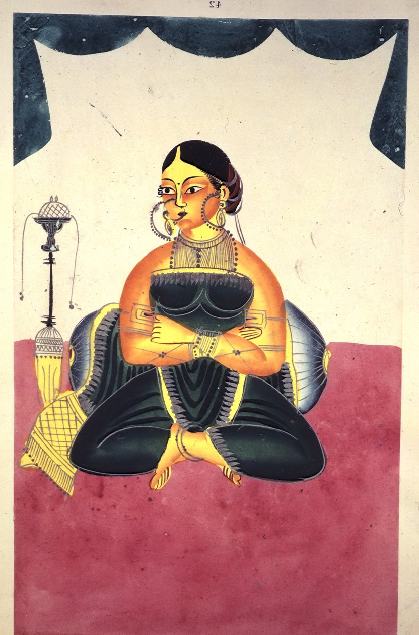 A Courtesan seated cross-legged beside a 