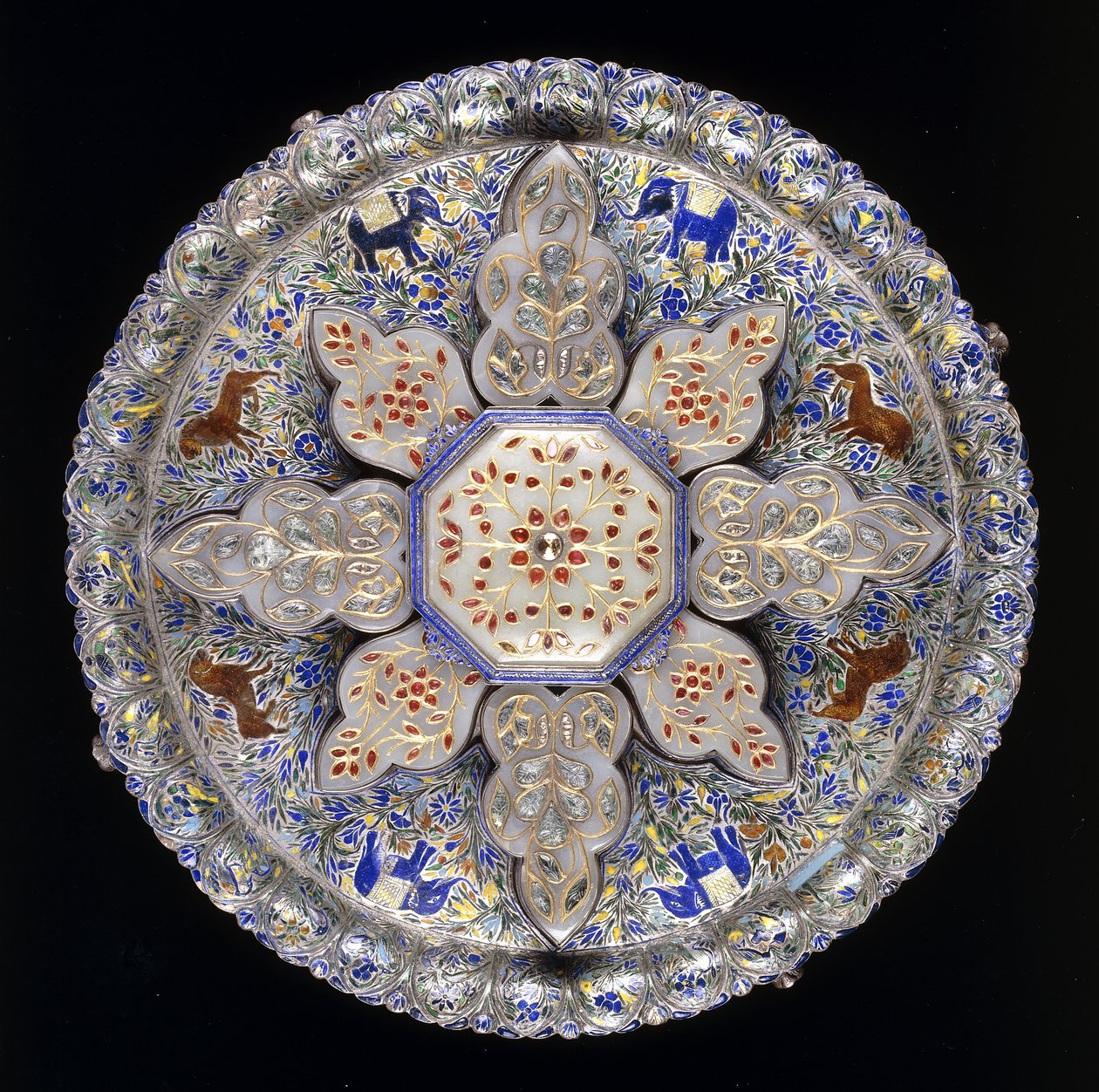 An Indian silver and inset jade sweetmeat dish, depicting lions and elephants amidst dense foliage, early 19th century by Indian School