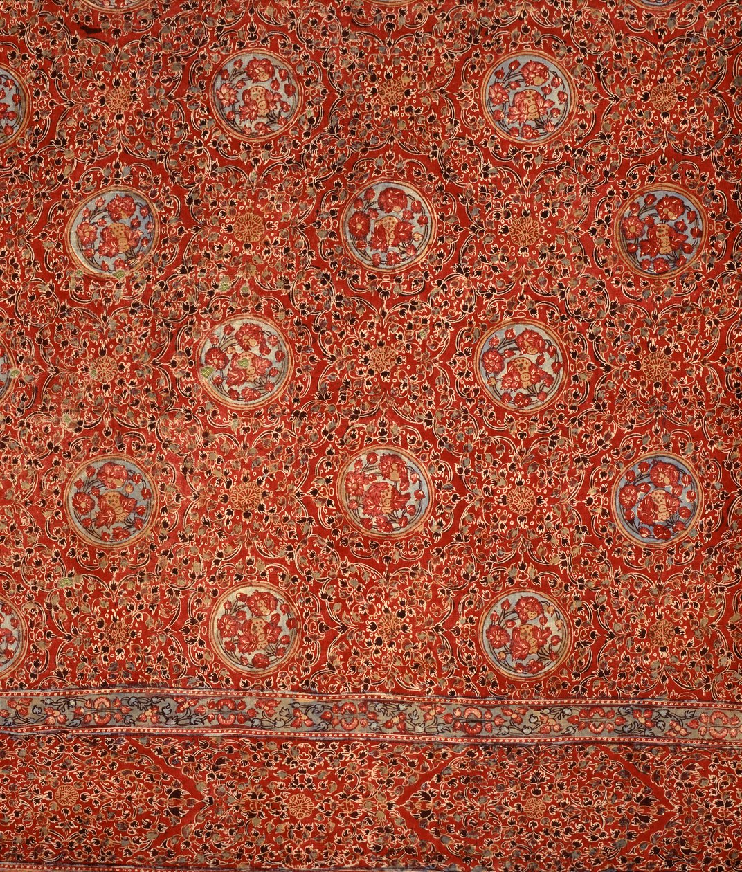 Fabric with a floral pattern and roundels within frames by Indian School