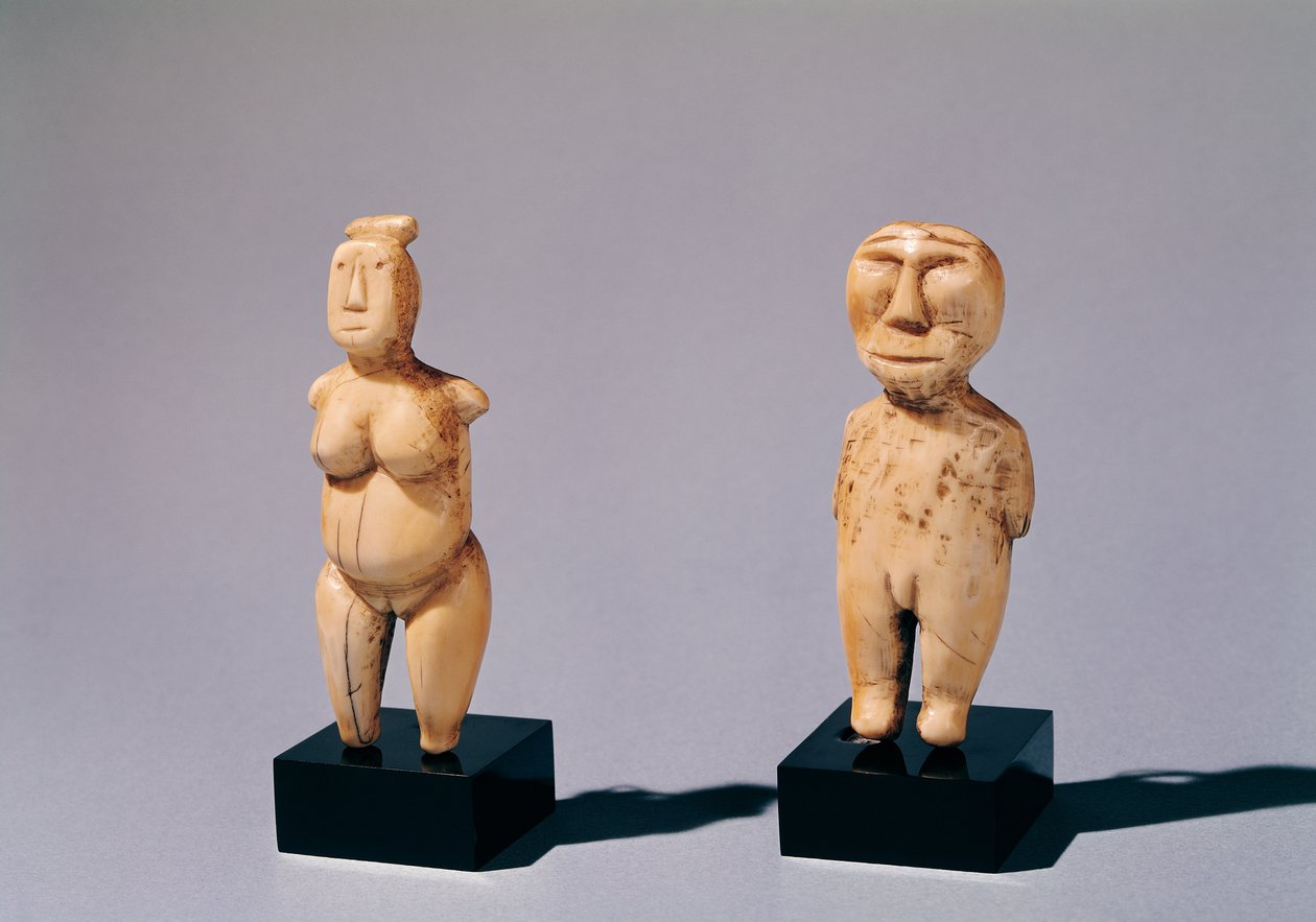 Two Statuettes of a Man and a Woman by Inuit School