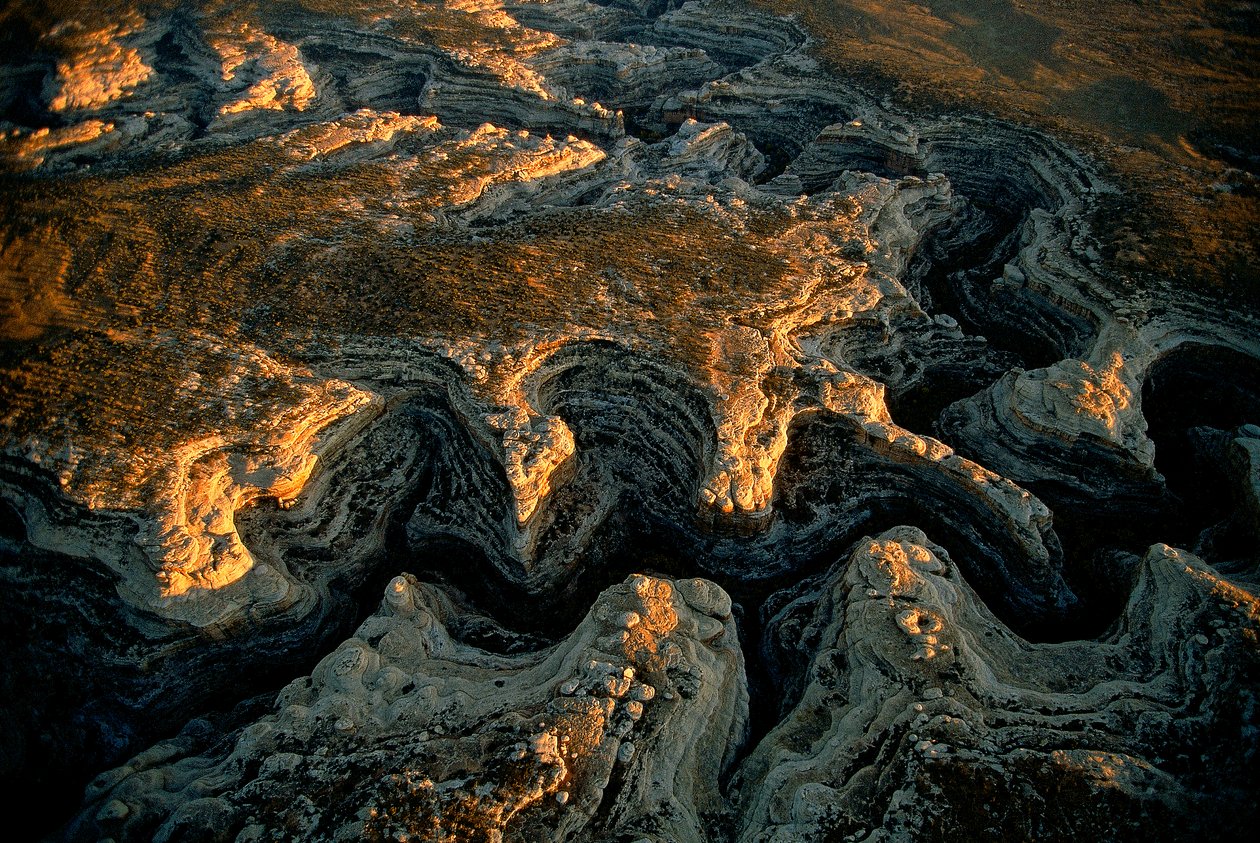 An aerial view of a parched Utah mesa- Grand Gulch delivered water to scores of small settlements by Ira Block
