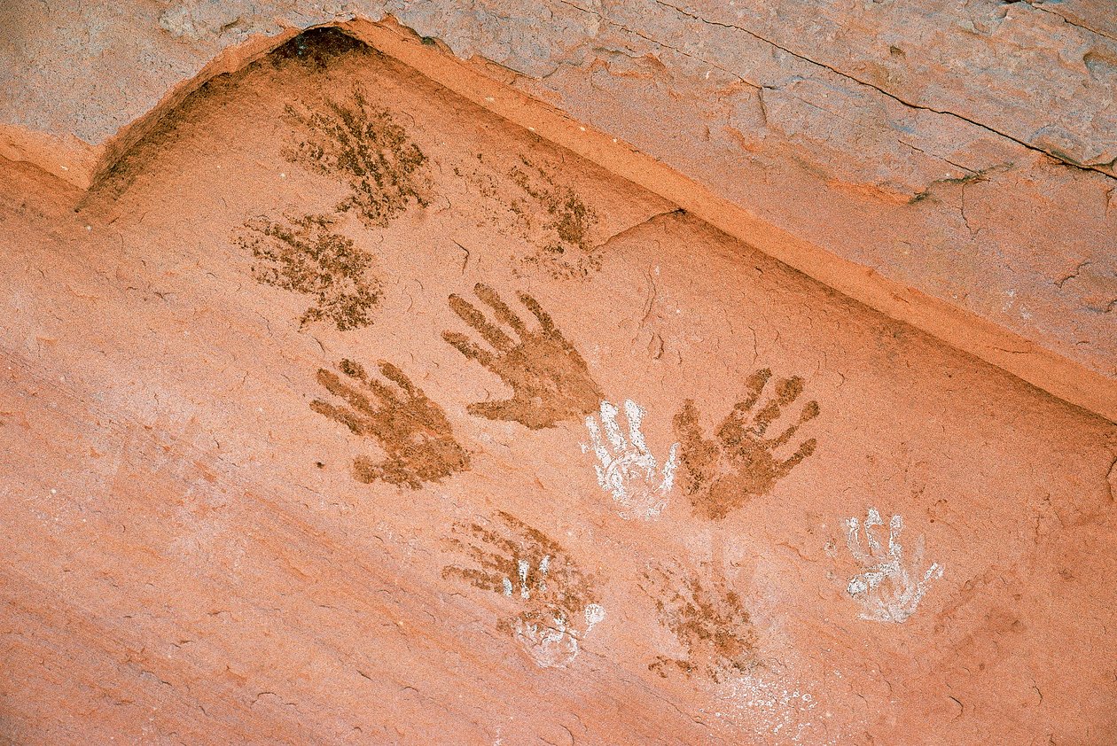 Anasazi handprint, ancient rock art found in Grand Gulch, Utah. by Ira Block