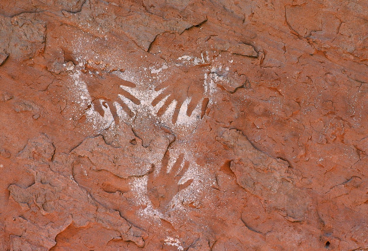 Ancient Anasazi rock art, a handprint in Grand Gulch, Utah by Ira Block