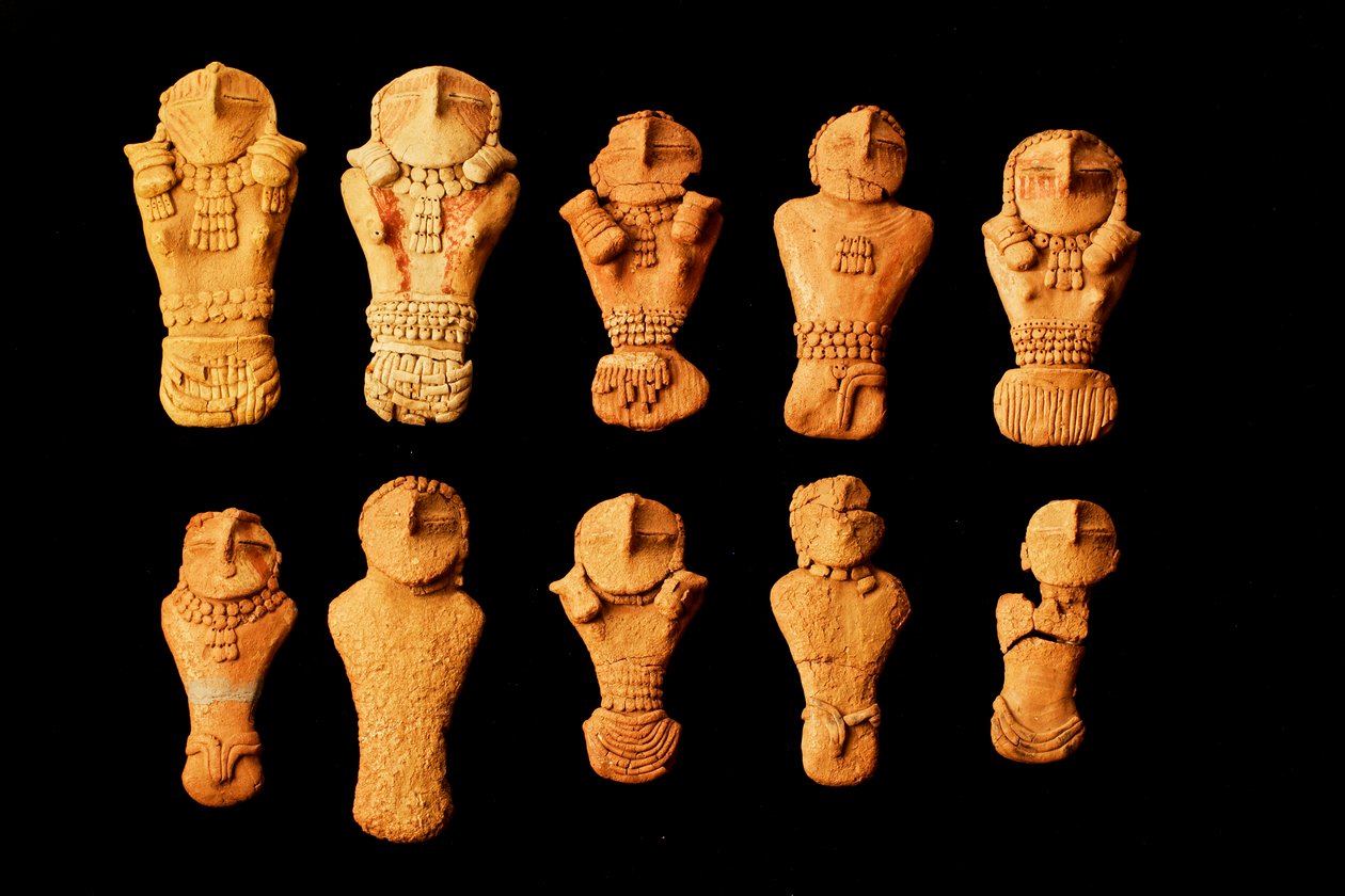 At the College of Eastern Utah Prehistoric Museum in Price, Utah the Fremont era Pilling Figurines, found near Range Creek by Clarence Pilling in 1950. by Ira Block