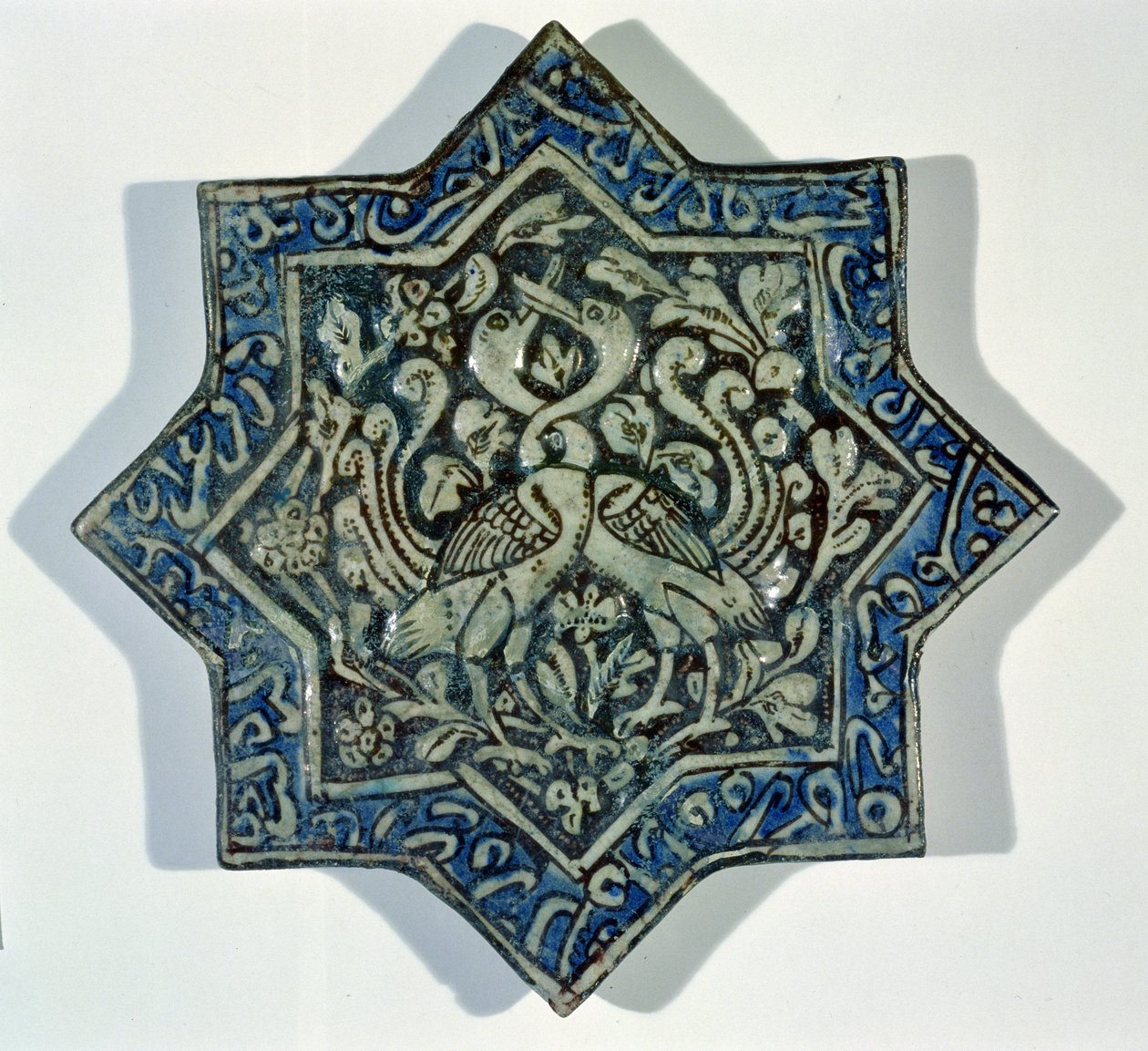 Star-shaped overglaze leaf-gilded tile in the style of Takht-e Solaiman by Islamic School