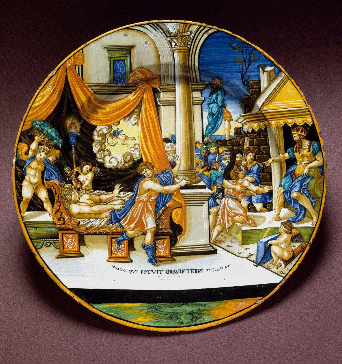 Joseph and the wife of Potiphar. Joseph fleeing from the wife of Potiphar seeking to seduce him. Ceramic plate produced in Urbino, Italy. Circa 1537. National Museum of Bargello, Florence, Italy by Italian School