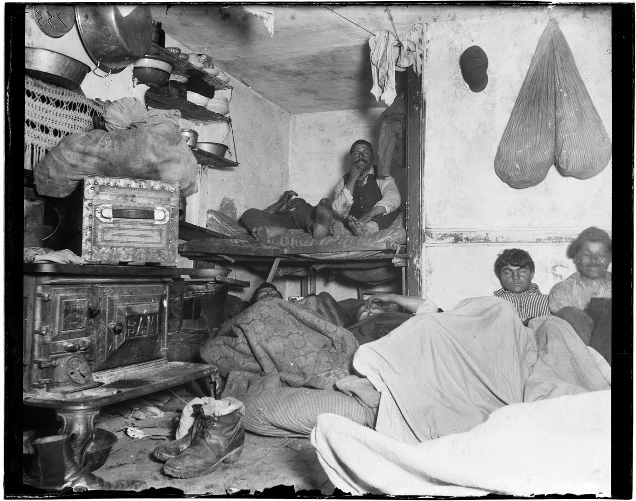 Lodgers in a crowded Bayard Street tenement - Five cents a spot by Jacob August Riis