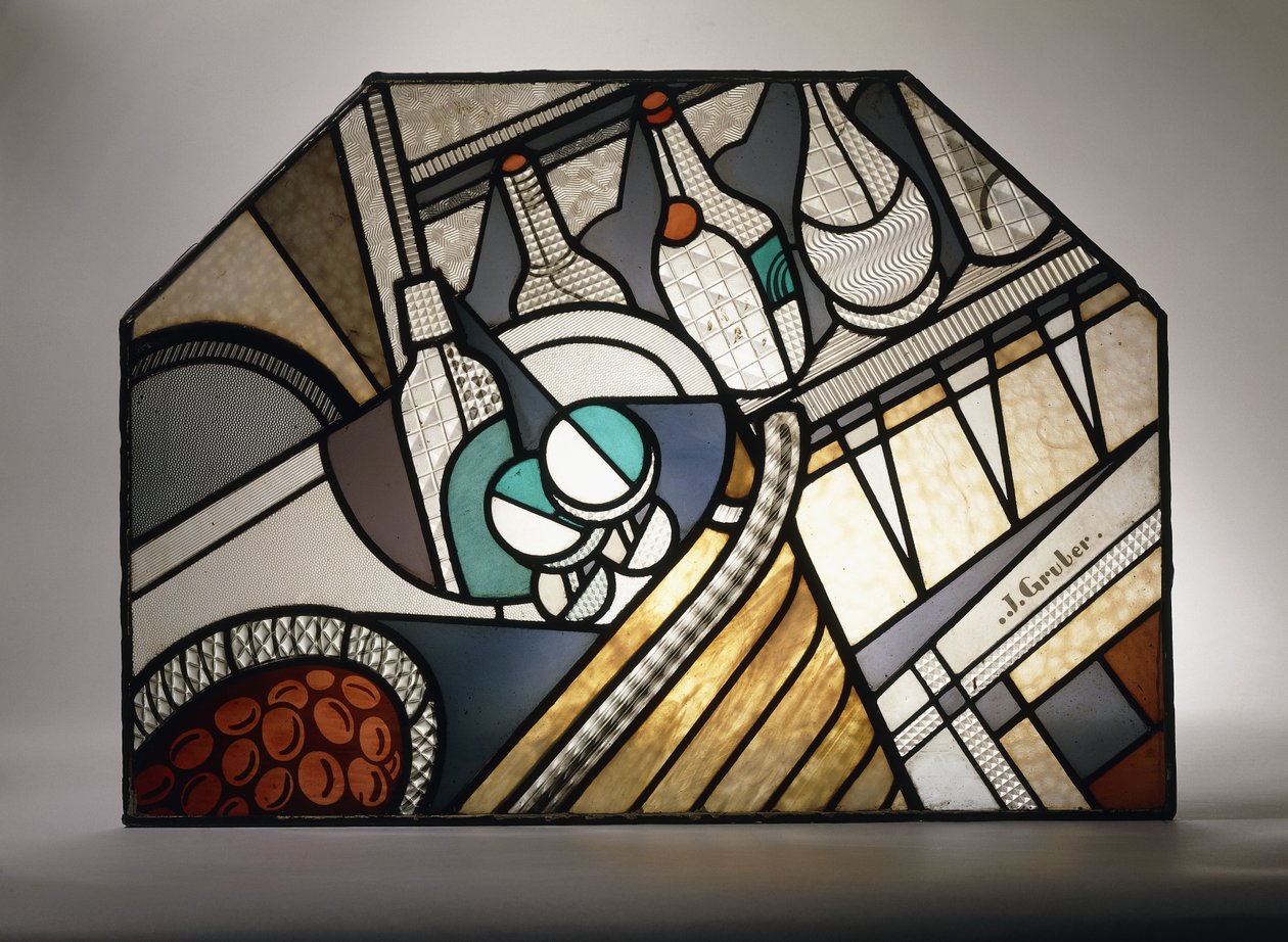 An Art Deco stained glass panel depicting a cocktail bar by Jacques Gruber