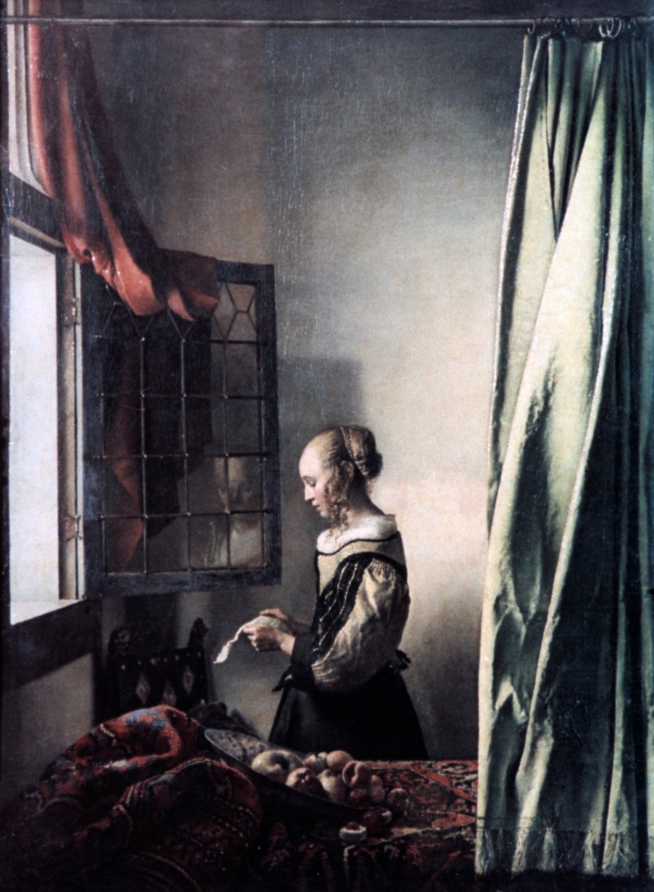 Girl Reading a Letter at an Open Window by Jan Vermeer van Delft