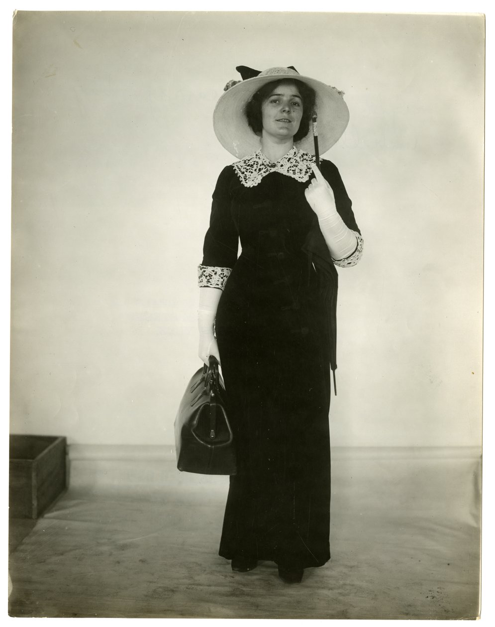 Right Way to Carry a Bag and Umbrella by Jessie Tarbox Beals