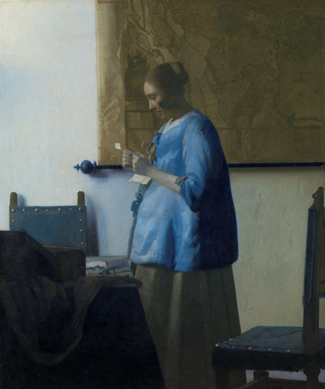 Woman in Blue Reading a Letter by Johannes Vermeer