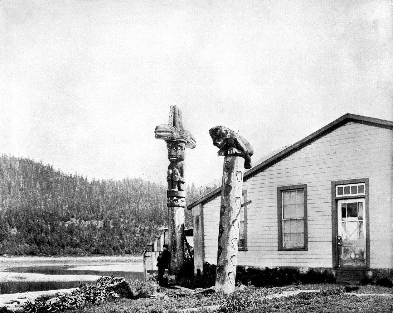Totem Poles, Alaska, USA by John L. Stoddard
