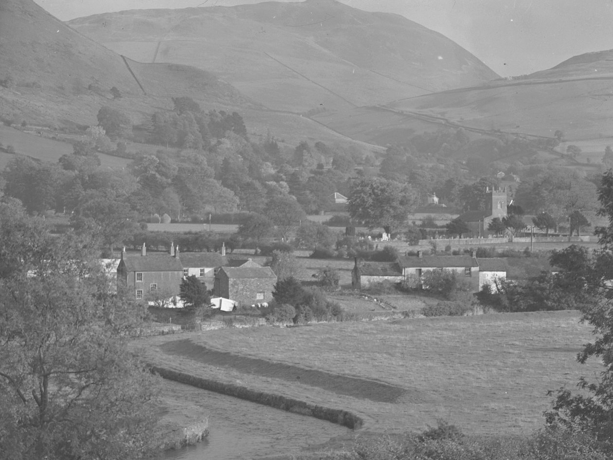 Orton Village buildings and church with fells behind by Joseph Hardman