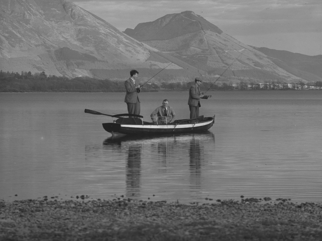 Three men in a rowing boat on a lake fishing, one man is seated, hills in background by Joseph Hardman