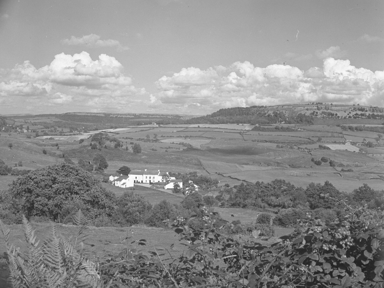 View of a building in farmland by Joseph Hardman
