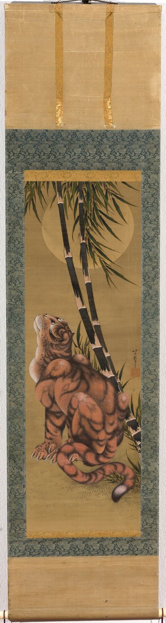 Tiger among the bamboo looking at the full moon by Katsushika Hokusai