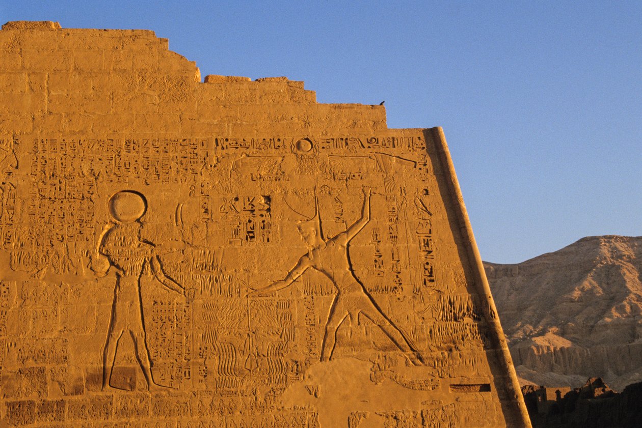 Ramses III smiting enemies, main temple, pylon, Medinet Habu, New Kingdom, Egypt by Kenneth Garrett