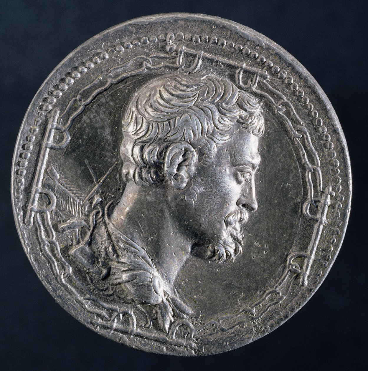 Reverse of medallion of Andrea Doria depicting the artist surrounded by the chains of a convict and with a galley in background, c.1541 by Leone Leoni
