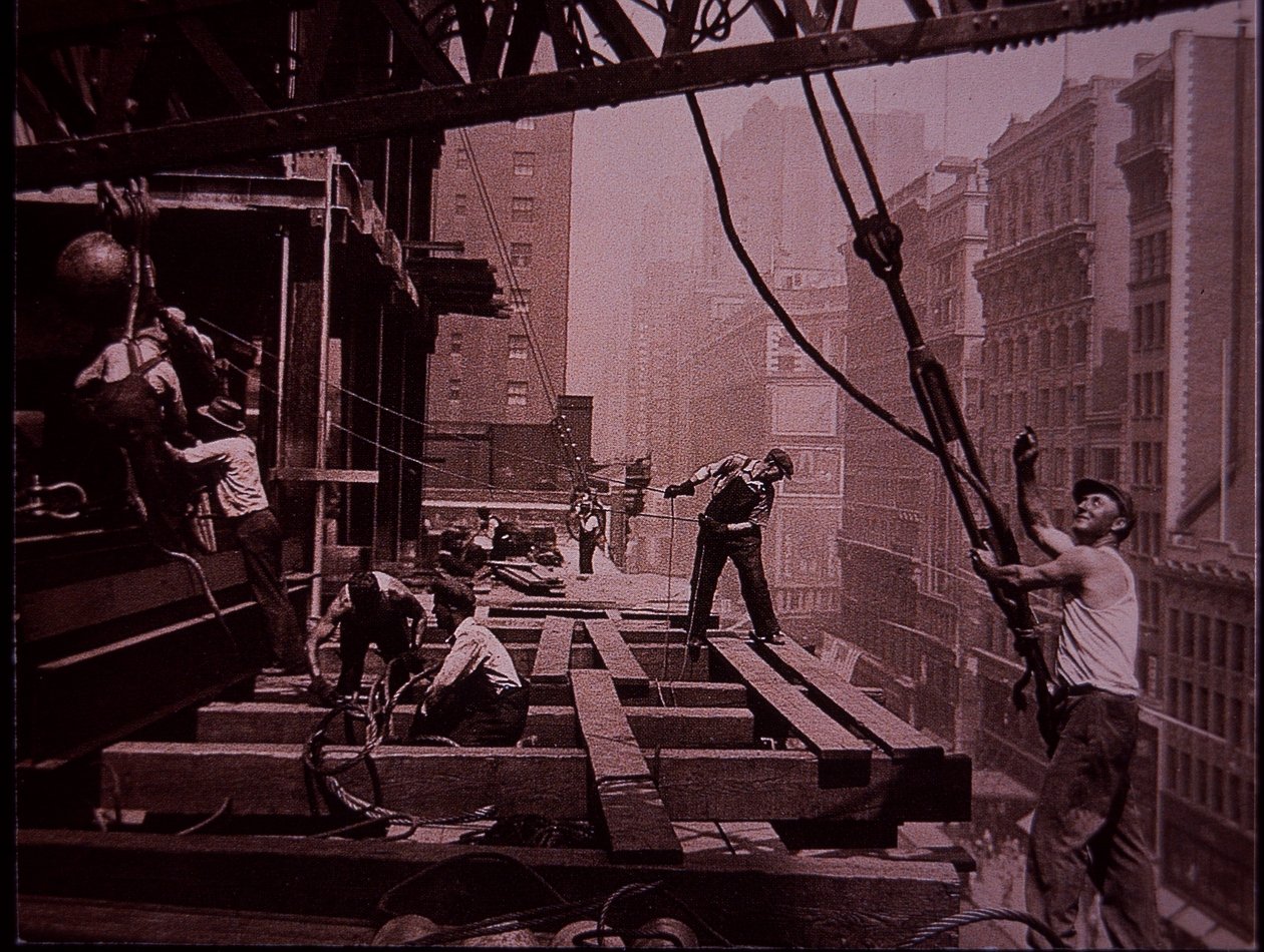 Empire State Building under construction, showing a lifting gang at work by Lewis Wickes Hine