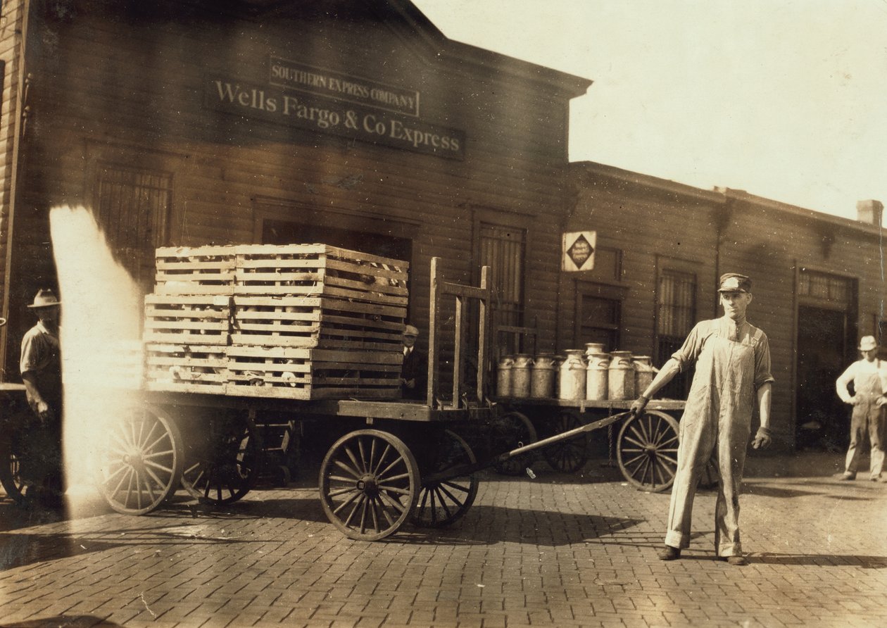Men in Front of a Wells Fargo and Co Express Depot with Crates and Milk Cans, Springfield, Missouri, 1916 by Lewis Wickes Hine