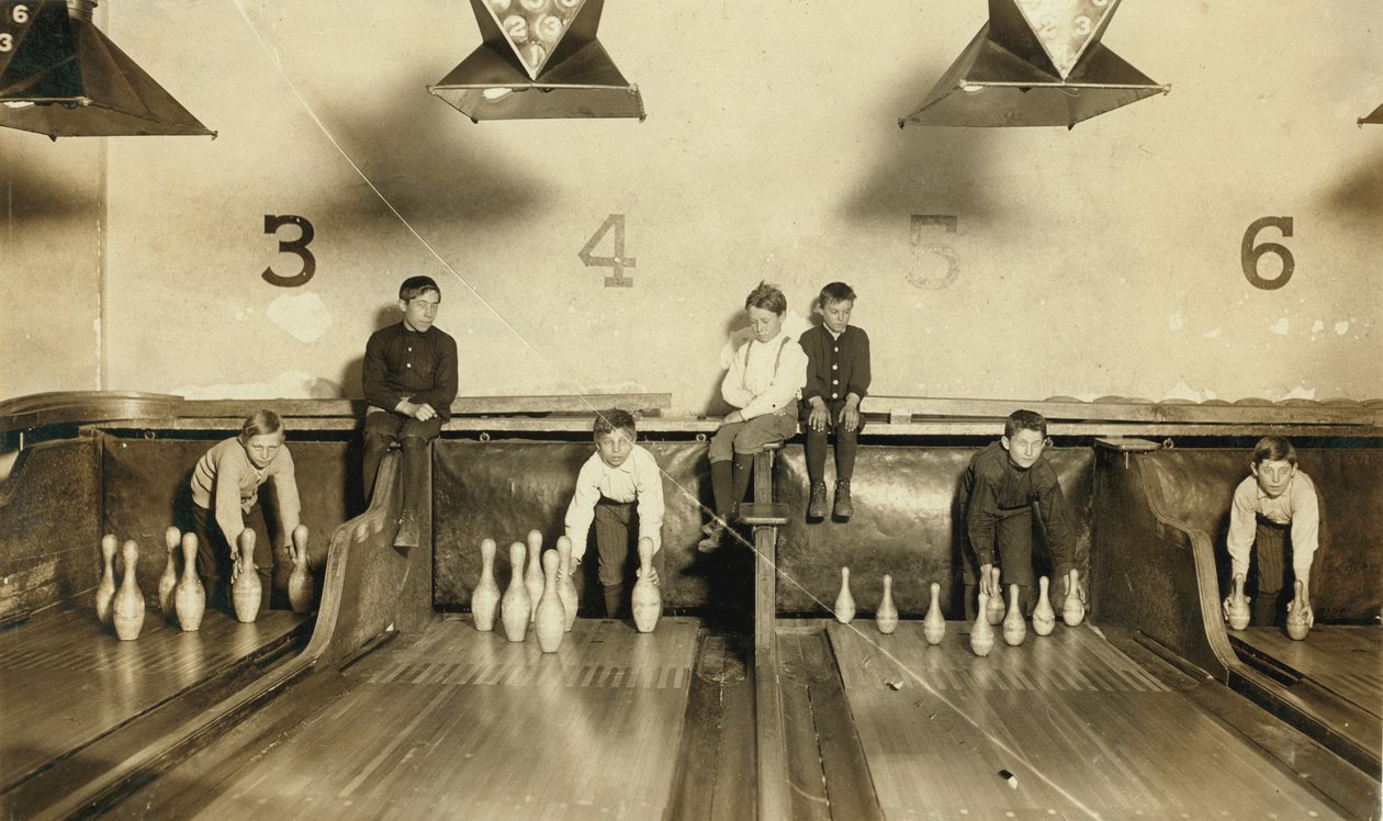 Young Boys Setting Up Bowling Pins at Arcade Bowling Alley Late at Night, Trenton, New Jersey, USA by Lewis Wickes Hine