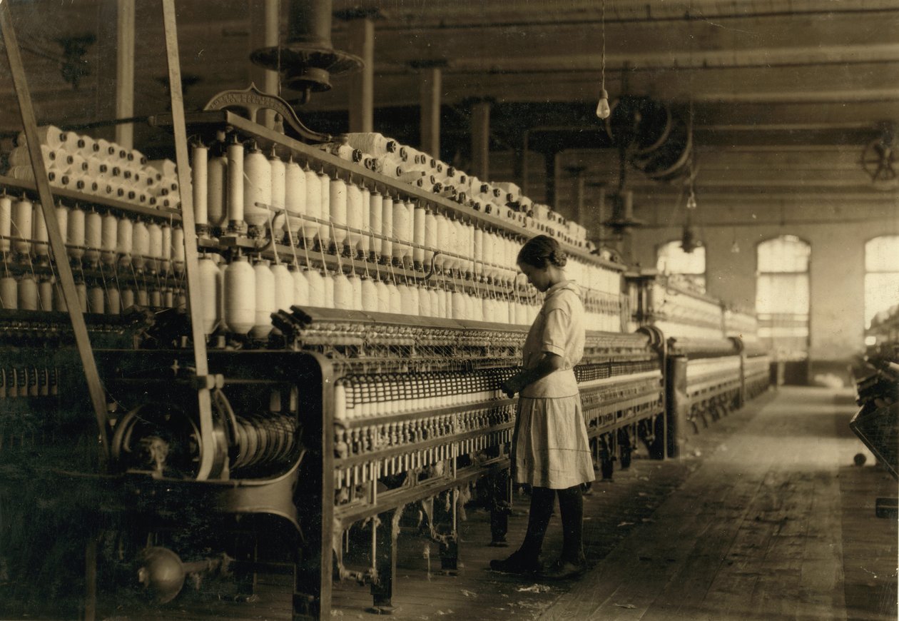 Young Teen Girl Working as Spinner at Cotton Mill, West, Texas, USA by Lewis Wickes Hine