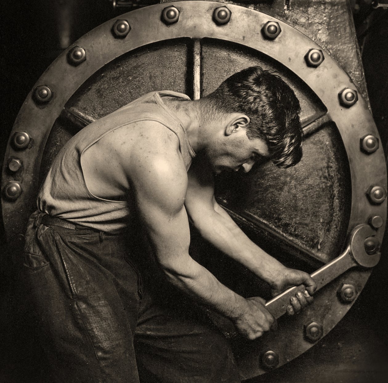 Close-up of a Power House Mechanic Working on Steam Pump c.1920 by Lewis Wickes Hine